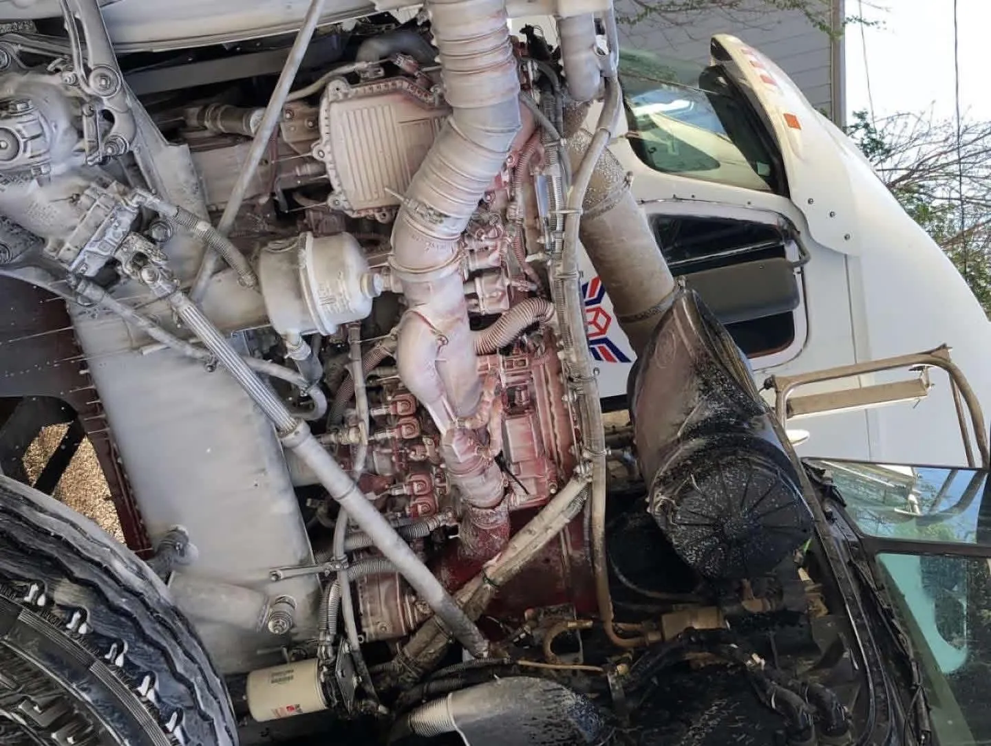 Semi truck engine wash in progress
