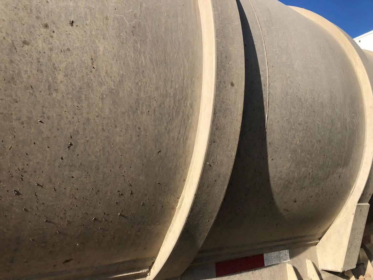 Close view of dirty tanker trailer before washing