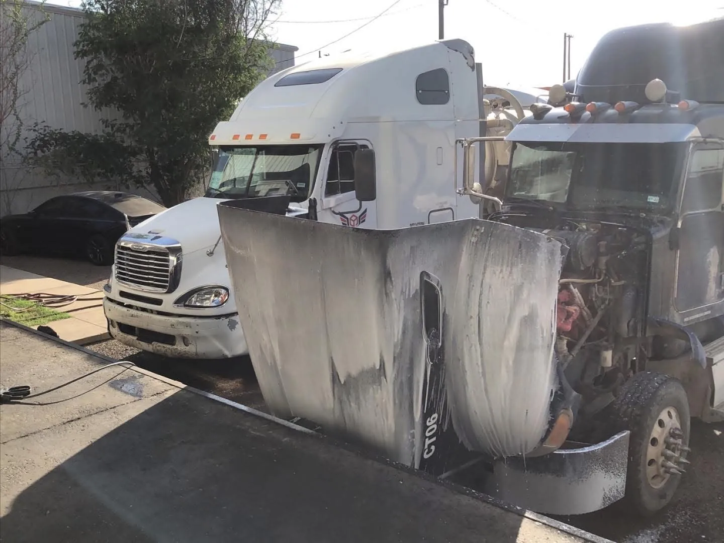 Semi tractors during fleet washing